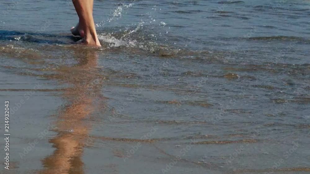 Sea surf on a sandy beach. Shoot from a low angle. Sea surf on a sandy beach. Shoot from a low angle.