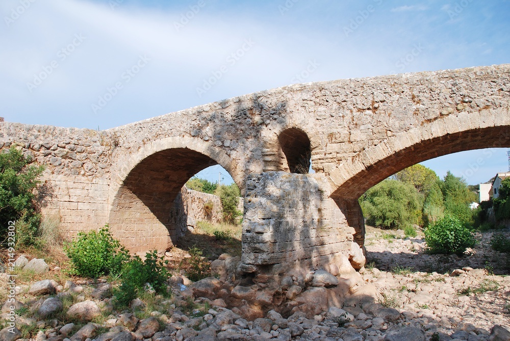 The Roman bridge across the Torrente de Sant Jordi at Pollenca on the Spanish island of Majorca.