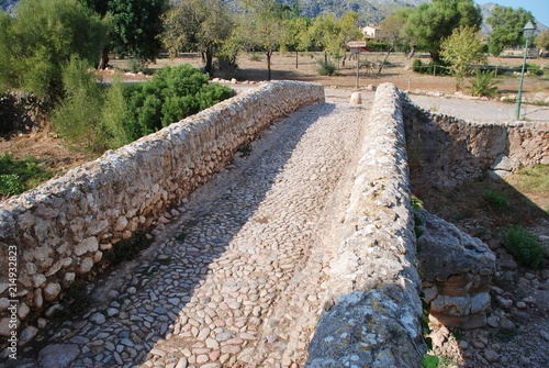 The Roman bridge across the Torrente de Sant Jordi at Pollenca on the Spanish island of Majorca.