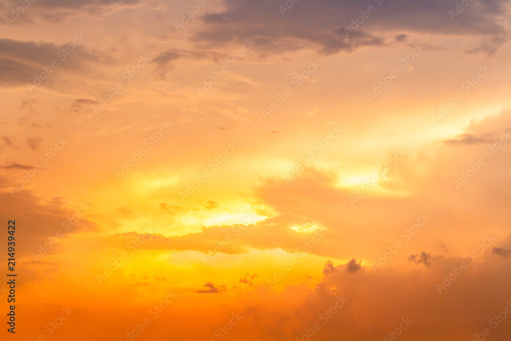 colorful dramatic sky with cloud at sunset..