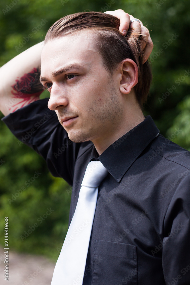 Portrait of a man with a tattoo Portrait of a man with a tattoo
