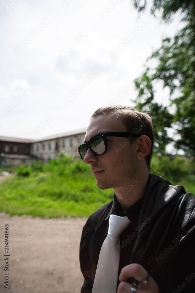 Portrait of a man wearing sunglasses Portrait of a man wearing sunglasses