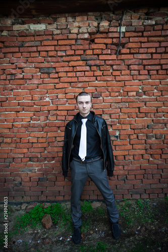the guy at the brick wall © Евгений Округин