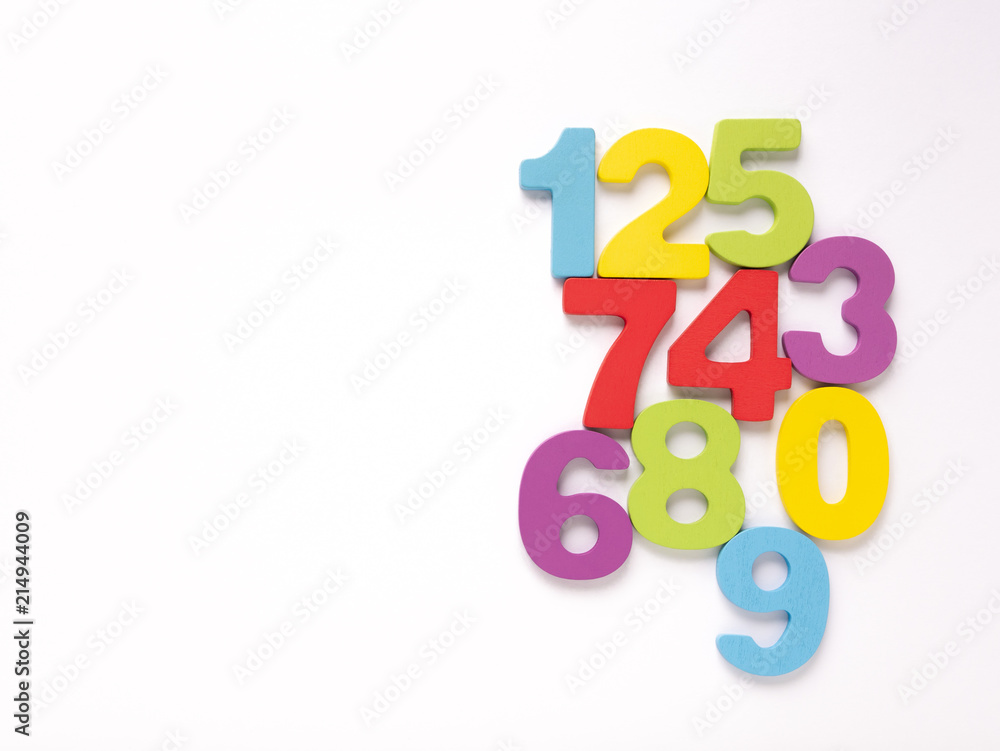 Colorful wooden numbers on white background, Number set zero to nine, top view and copy space Colorful wooden numbers on white background, Number set zero to nine, top view and copy space