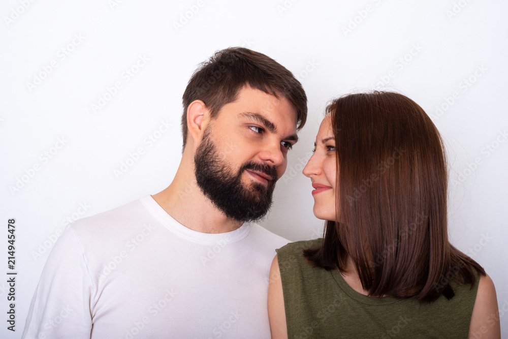 Young couple nice smiling and looks each to other Young couple nice smiling and looks each to other