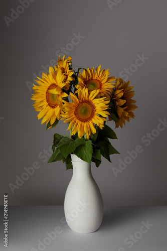 Wallpaper Mural beautiful bouquet of yellow sunflowers in vase, on grey Torontodigital.ca
