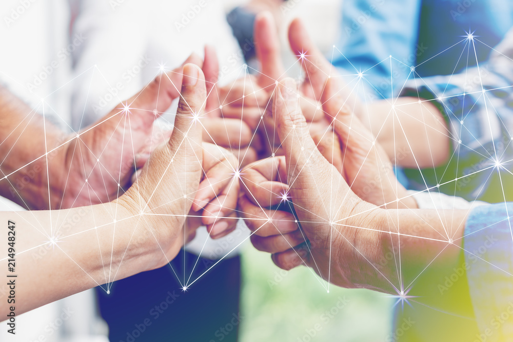 Business partners team achievement concept. Multi-ethnic diverse group of colleagues join hands together. Creative teamwork,business agreement. Important of teamwork. - obrazy, fototapety, plakaty 