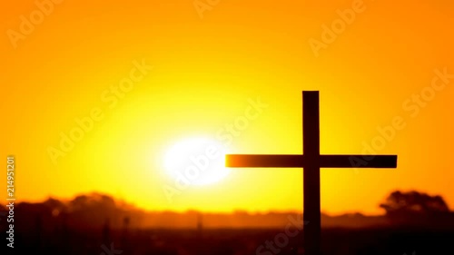 4К. Orange sunrise Christian Cross, Believe team. Time-Lapse. photo