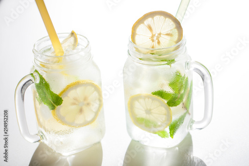 Citrus lemonade water with lemon sliced , healthy and detox water drink in summer