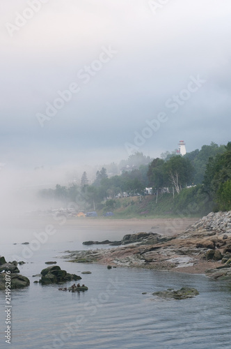 Northern Quebec Foggy Evening with Lighthouse and Village