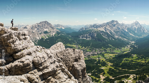  Via ferrata Tofana di Mezzo climbers on the ridge in the Dolomites, Group of climbers on the mountain top, Dolomite Alps, Italy. Silhouette of people climbing the mountain. Tiny Man Big Landscape  photo