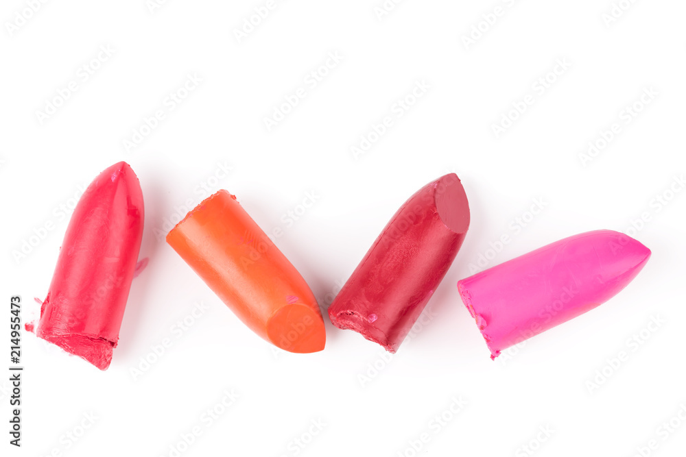Top view of lipstick slices on white background Top view of lipstick slices on white background