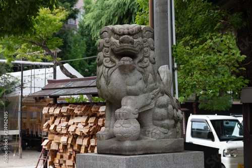 Japanese stone lion statue in Nanba Yasaka Shrine .