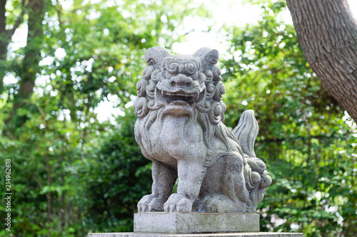 Japanese stone lion statue in Nanba Yasaka Shrine .