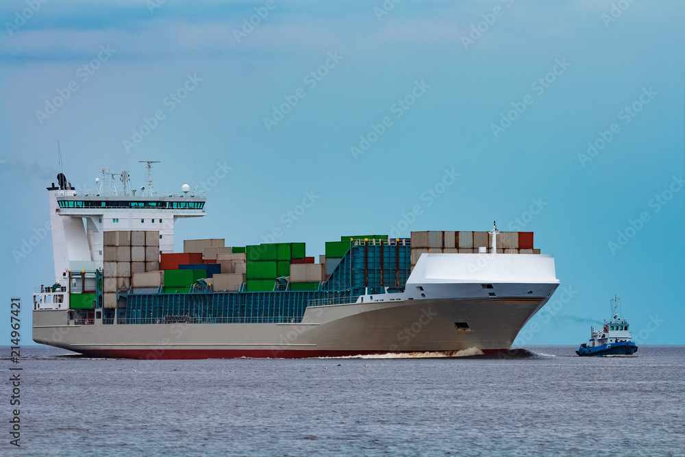 Obraz premium Grey container ship underway