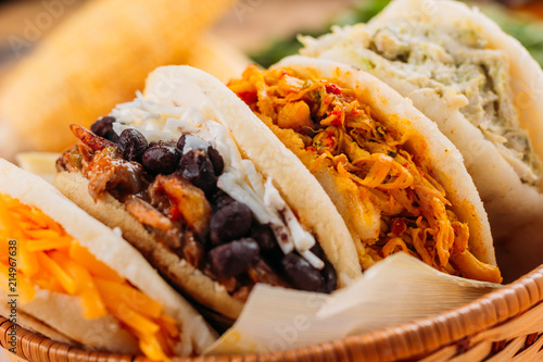 Combination of the typical South American Arepas in a woven basket