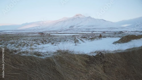 Mountain in Skagaströnd, Iceland, a sleepy fishing village in the north of Iceland. Filmed in the winter months in the cold ice and snow. photo