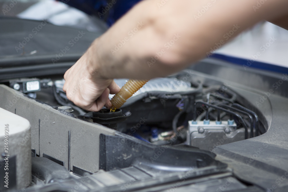People are repair a car Use a wrench and a screwdriver to work.Safe and confident in driving People are repair a car Use a wrench and a screwdriver to work.Safe and confident in driving