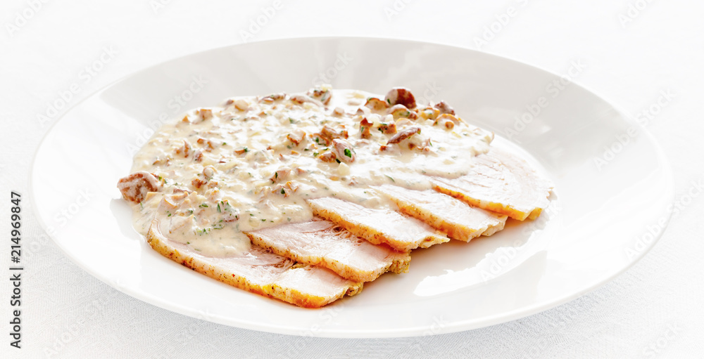 oven baked pork slices with cream and chanterellas sauce oven baked pork slices with cream and chanterellas sauce