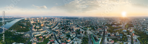 A big 360 degrees panorama of the city of Kiev at sunset. A modern metropolis in the center of Europe against the backdrop of sunset sky from a bird s eye view. Aerial view. Panorama of the Tourist