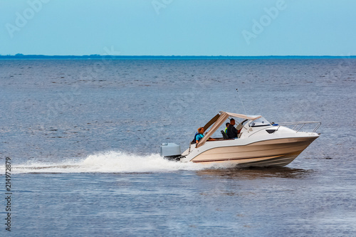 White speed boat in action