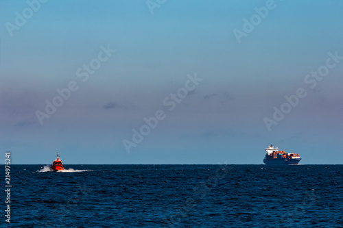 Blue container ship in Baltic sea