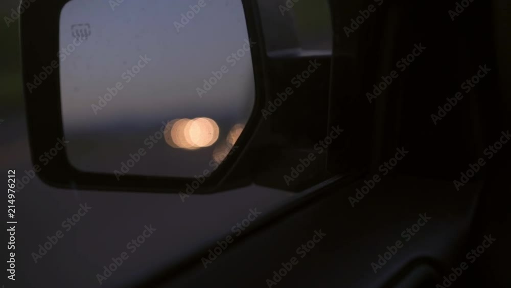 Car Door Side Mirror On The Freeway During Sunset On A Summer Day Car Door Side Mirror On The Freeway During Sunset On A Summer Day
