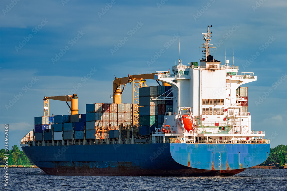 Fototapeta premium Blue container ship underway