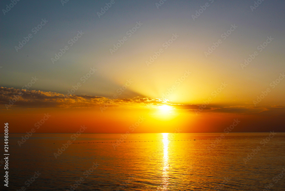 Seascape with sundown sun Seascape with sundown sun