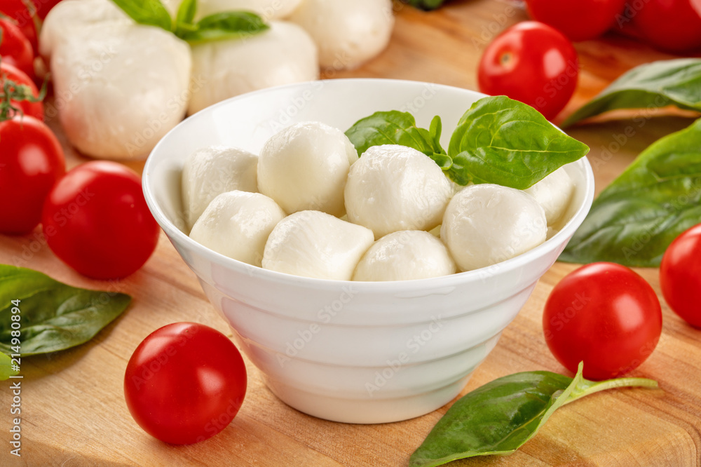 Delicious mozzarella and ripe tomatoes Delicious mozzarella and ripe tomatoes