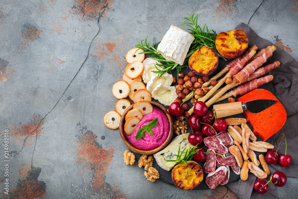 Assortment of spanish tapas or italian antipasti with hummus Assortment of spanish tapas or italian antipasti with hummus