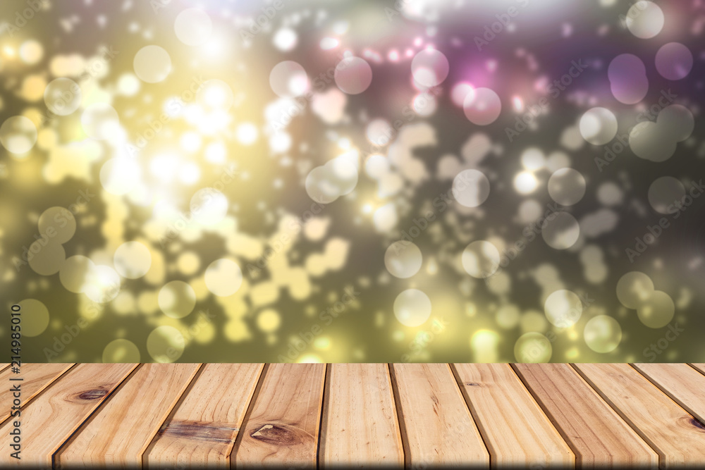 Empty wooden table on front blurred colorful bokeh background, abstract background, presnetation, template Empty wooden table on front blurred colorful bokeh background, abstract background, presnetation, template