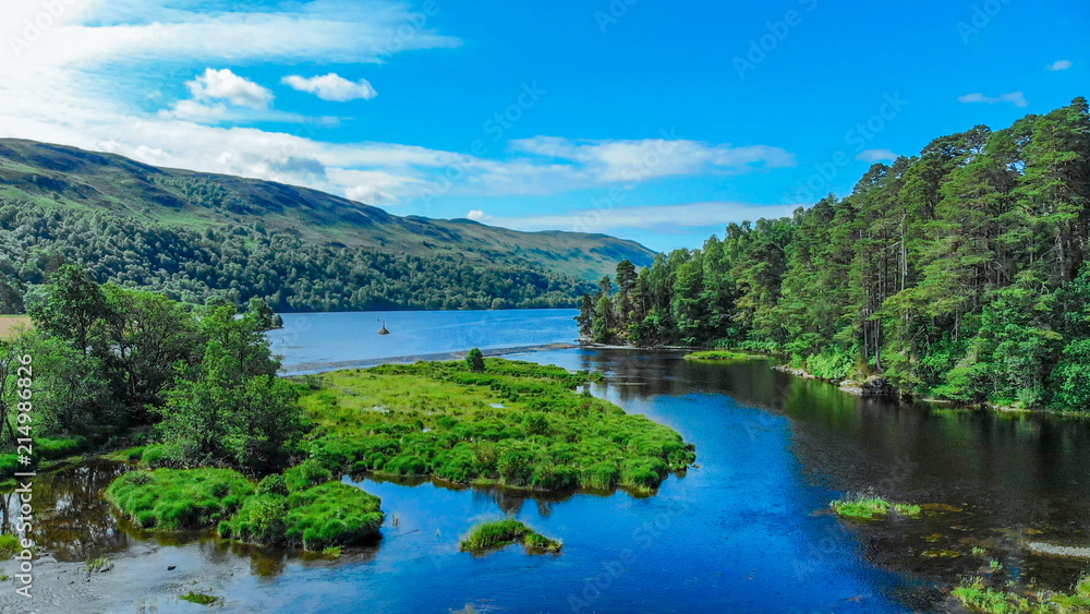 Amazing landscape with creeks and lakes in the Scottish Highlands - romantic aerial view Amazing landscape with creeks and lakes in the Scottish Highlands - romantic aerial view