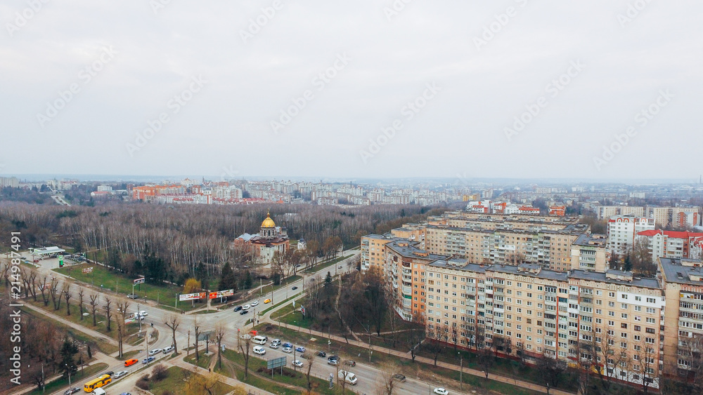Beautiful small town with a bird's-eye view in early spring, park and church. aerial view Ternopil. Ukraine