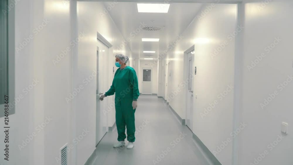 Laboratory worker run pharmaceutical machine for mixing powder and granules Laboratory worker run pharmaceutical machine for mixing powder and granules