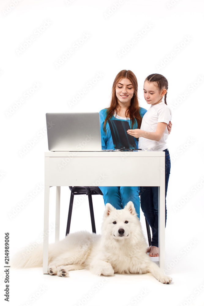 Veterinarian with dog, on table in vet clinic, animal and pet doctor. Medicine and health care concept. Veterinarian with dog, on table in vet clinic, animal and pet doctor. Medicine and health care concept.