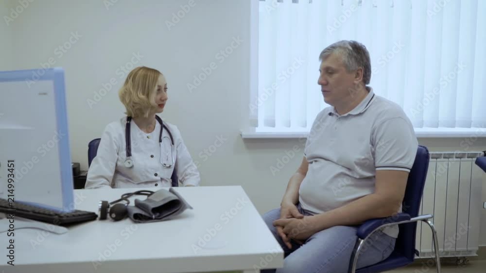 Senior man complain to doctor about his problems with health Senior man complain to doctor about his problems with health