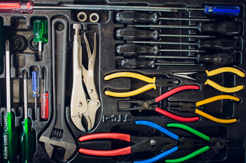 Box with special tools in car repair shop photo