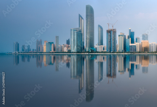 View of Abu Dhabi Skyline at sunrise, UAE © boule1301