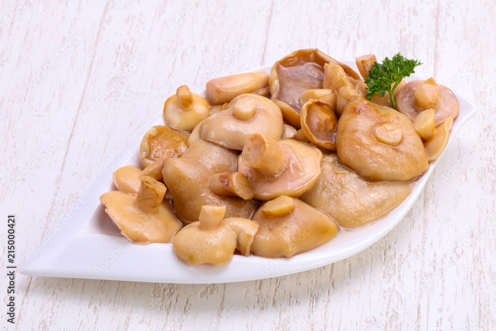 Pickled mushrooms in the bowl Pickled mushrooms in the bowl