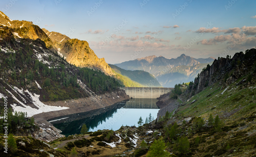 Dam in the Mountains at Sunrise