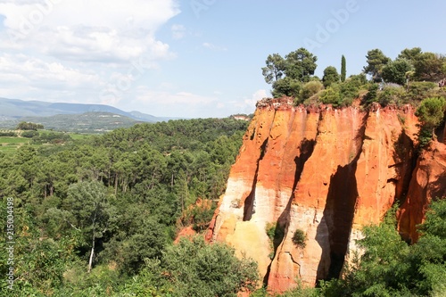Red ocher cliffs in the village of Roussillon in Provence, France