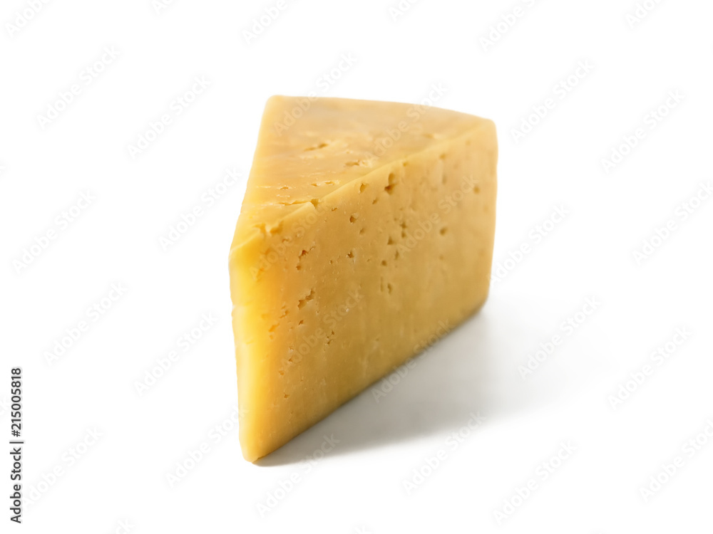 Piece of hard cheese on isolated white background