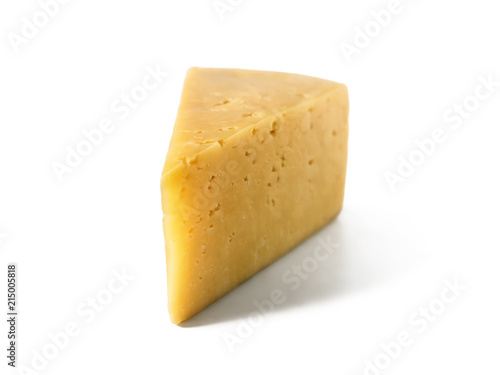 Piece of hard cheese on isolated white background
