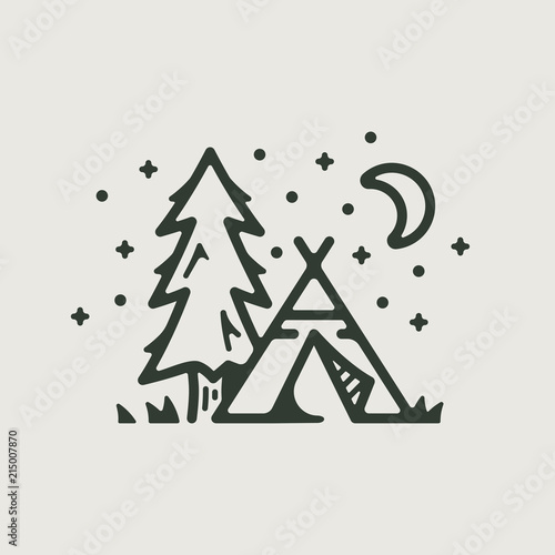Camp teepee and tree
