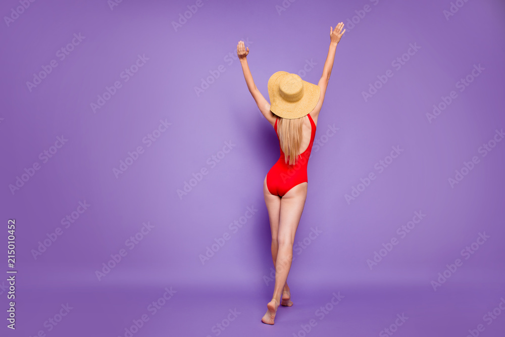 Tourism suntan people person concept. Rear behind view photo of excited cheerful rejoicing lady moving on sand to the sea wants to get suntan isolated violet purple color bright background copy space