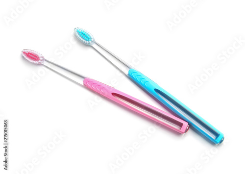 Color toothbrushes on white background. Dental care