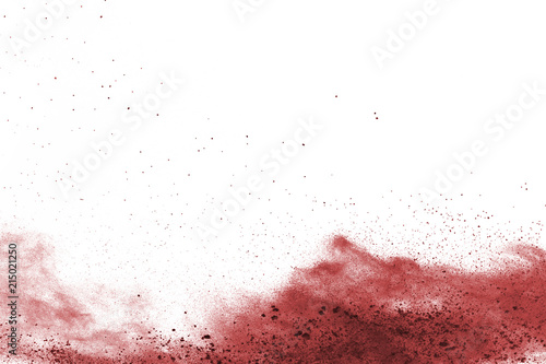 Freeze motion of red powder exploding  isolated on white background. Abstract design of red dust cloud. Particles explosion screen saver  wallpaper