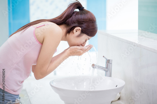 woman wash her face