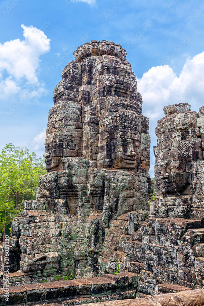 Tower with Buddha images in the temple of Angkor Tom in Cambodia.